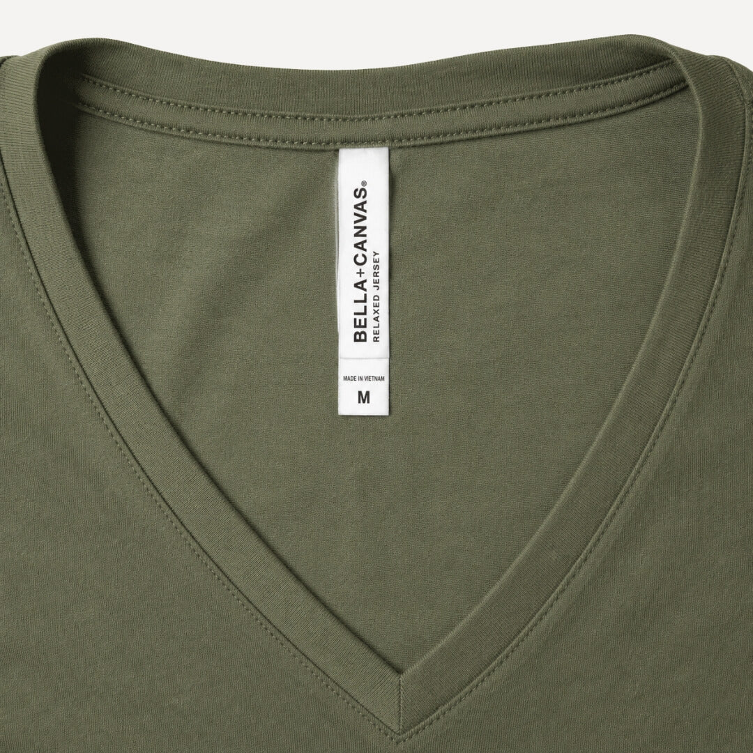 Close up of Bella + Canvas Womens' Relaxed Jersey V-Neck T-Shirt military green tag and fabric detail