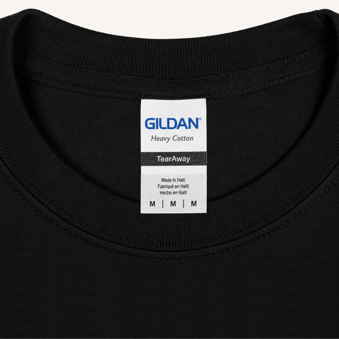 Close-up of Gildan Heavy Cotton Long-Sleeve T-Shirt tag and fabric detail