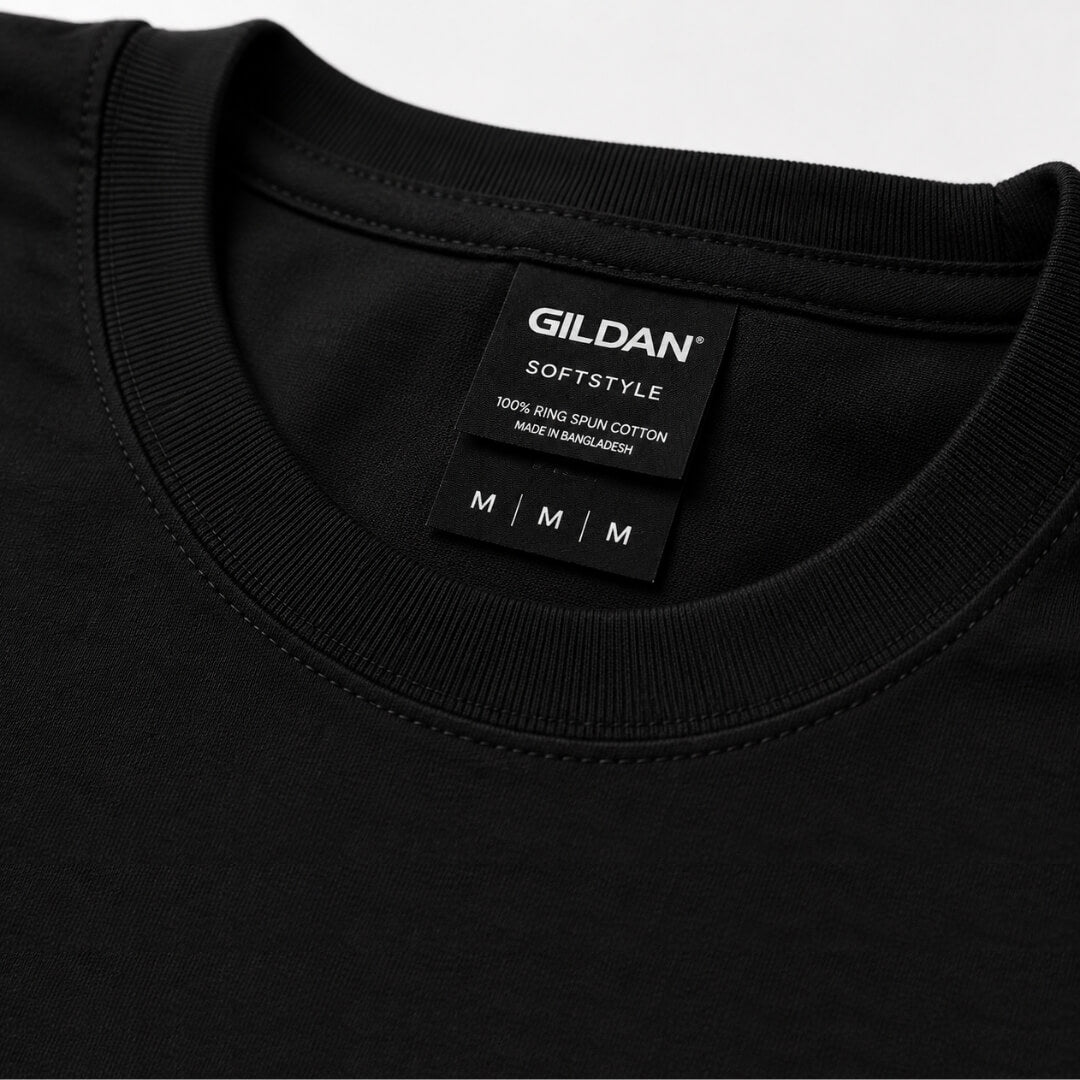 Close-up detail of black Gildan Softstyle t-shirt fabric