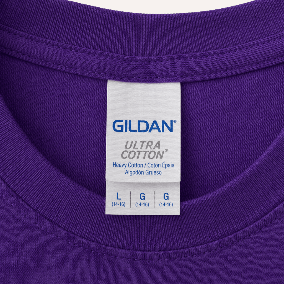 Close-up of Gildan Youth Ultra Cotton T-Shirt tag and fabric detail in Purple